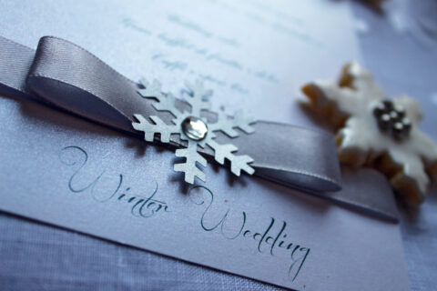 Winter,Wedding,Text,With,Ribbon,And,Metal,Snowflake